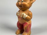 an image of a figurine of a pig with a hat on his head