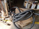 a bunch of hoses that are sitting on the ground