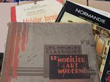 many books that are sitting on a table