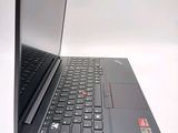 a laptop computer sitting on top of a white table