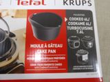 a box with a picture of a cake pan in it