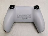 a close up of a game controller on a table