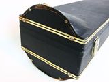 a black suitcase that is sitting on a white surface