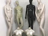 three mannequins that are standing next to each other