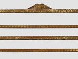 two wooden shelves with ornate designs on them