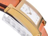 an image of a close up of a watch on a white surface
