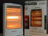 a white heater sitting next to a box on a table