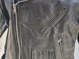 a black leather jacket on a mannequin mannequin mannequin mannequin mannequin mannequin mannequin mannequin