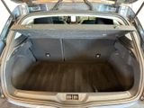 a trunk of a car with the doors open