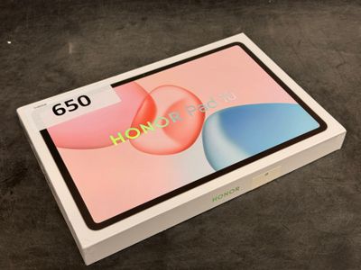 a close up of a box with a tablet on it