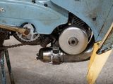 a close up of a motorcycle with a chain attached to it