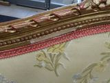 an image of a gold and red couch in a living room
