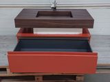 three drawers stacked on top of each other on a pallet