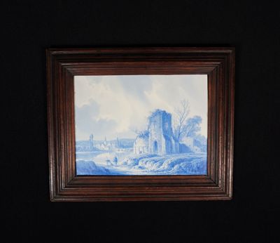 peinture sur le mur d'une salle de bains équipée de toilettes et d'un lavabo