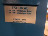 a label on the side of a machine that says tfx - 35 wl