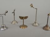 five different types of metal objects sitting on a table