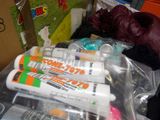 a pile of assorted items sitting on top of a table