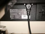 an image of a computer power cord plugged into a computer