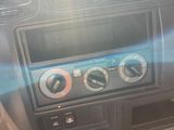 a picture of a car dashboard with buttons and controls
