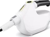 un gros plan d'un aspirateur à main sur fond blanc