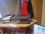 a desk with a computer and a monitor on it