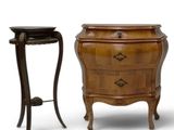 a pair of nightstands with drawers and a side table