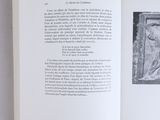 an open book with a picture of a man on it