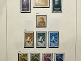 an image of a picture of a collection of stamps on a wall