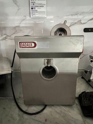 a machine that is sitting on a counter in a kitchen