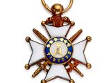 gros plan d'une médaille sur fond blanc