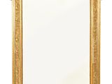 an image of a gold framed mirror on a white background