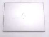 a laptop that is sitting on a white table