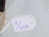 a watch that is sitting on top of a plastic bag