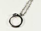 sterling silver circle pendant with chain on a white background