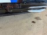 a close up of a car with a sticker on it ' s bumper