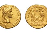 a gold coin with an image of a man and a woman on it