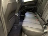 the back seats of a car with a seat belt in a car