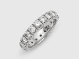 a close up of a diamond ring on a white background