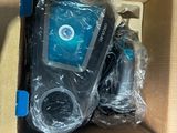 a cardboard box with a cell phone inside of it