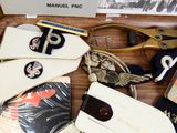 a table with many items on it including a pair of scissors and a pair of scissors