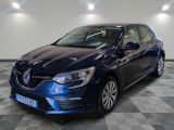 a blue car is parked in a room with a checkered floor