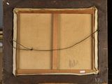 painting on easel with a piece of paper taped to it