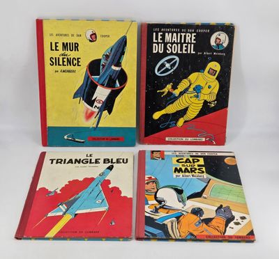 trois livres pour enfants sont alignés sur une surface blanche