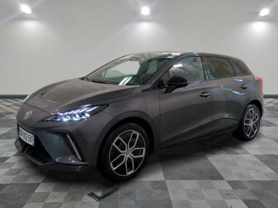 a grey toyota c - hr is parked on a checkered floor