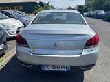 a silver car parked on the side of the road