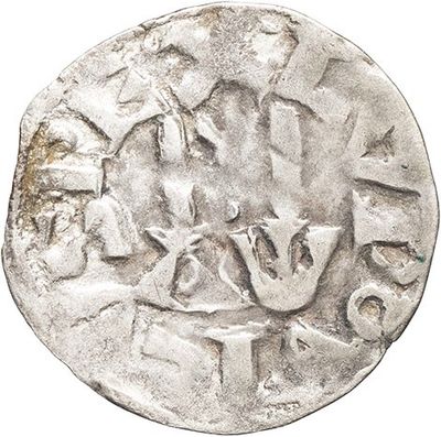 a silver coin with an image of a man on a horse