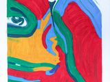 a picture of a painting of a woman ' s face on a piece of paper