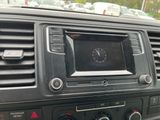 a car dashboard with a clock on the display