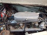 a small engine in the back of a truck