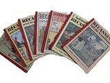 six livres pour enfants sont empilés les uns sur les autres sur une surface blanche